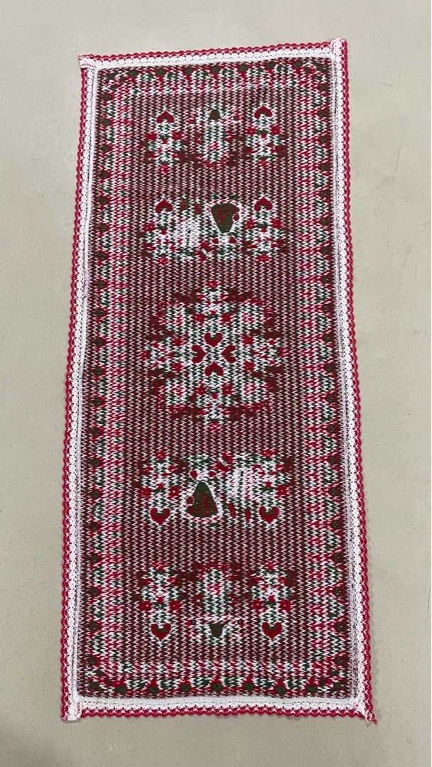 Vintage Embroidered Table Runner - Folk Art Design (Category: Table Linen & Textiles) located in Quezon City. Submitted by meggoquingco (Listing ID 1462521404, Image 3). Description: - Beautiful embroidered table runner - Folk art design with intricate red and green patterns - Features delicate lace trim - Adds a charming touch to any table setting - Ideal for holiday or everyday decor.