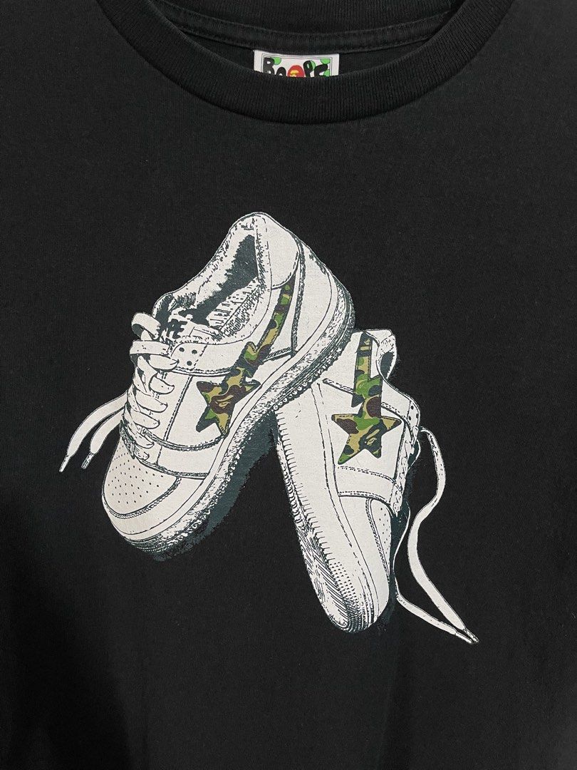 Vintage OG BAPE “Bapesta” Sneakers Tee (Category: Tshirts & Polo Shirts ) located in Navotas City. Submitted by yodailyplug (Listing ID 1462645367, Image 2). Description: Width 20” Length 27” Single Stitch Authentic/Legit Very good No hairlines.