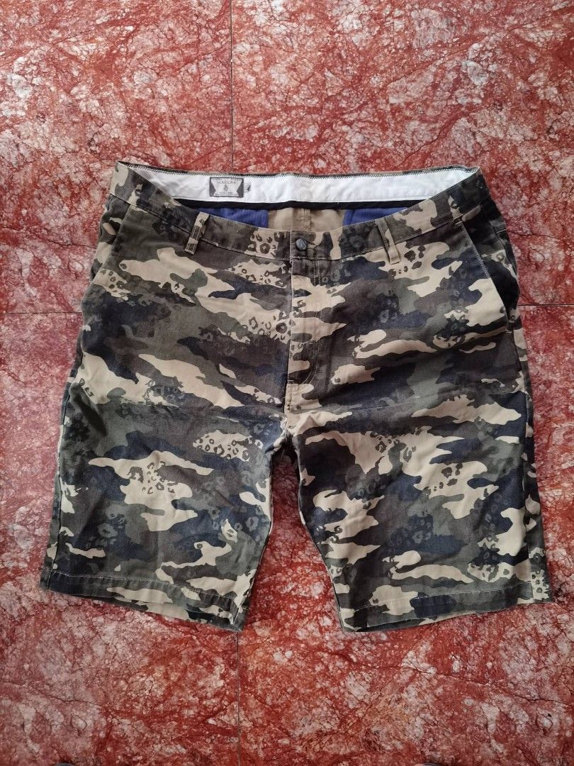 Volcom Camouflage Cargo Shorts (Category: Shorts) located in Caloocan City. Submitted by cooldudeszion (Listing ID 1462521077, Image 1). Description: - Authentic Volcom camouflage cargo shorts - Classic cargo style with multiple functional pockets - Secure button and zip fly closure - Perfect for casual outings or outdoor adventures - Designed for a comfortable fit VOLCOM CAMOU SHORT (Corpo Classic) - Button and zipper closure - Multiple pockets 