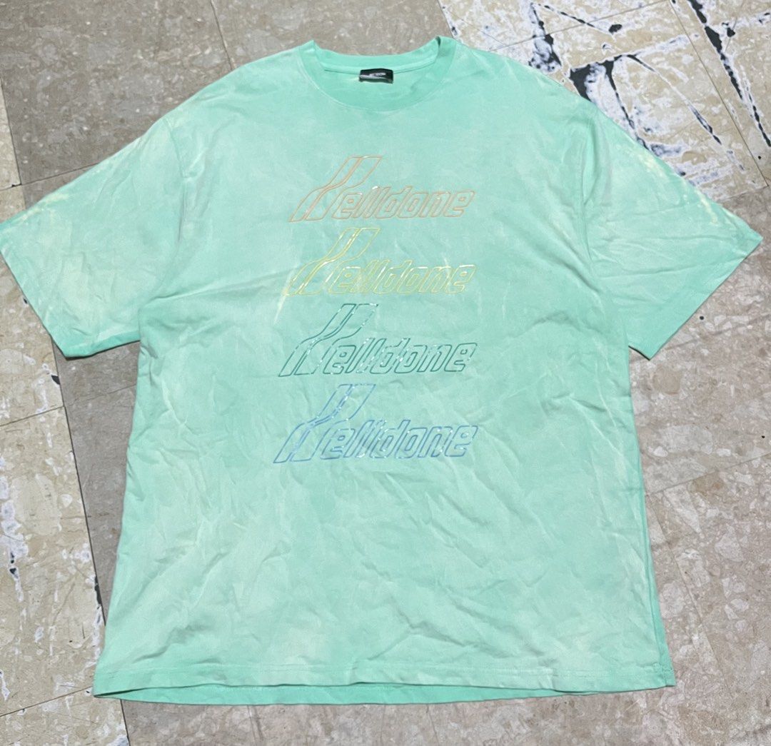 WE11DONE Mint Green Gradient Logo T-Shirt (Category: Tshirts & Polo Shirts ) located in Manila. Submitted by jlogup08 (Listing ID 1462628420, Image 1). Description: - Authentic WE11DONE mint green t-shirt - Features repeated brand logo with gradient effect -XL best fit - **Important:** Hand wash alone to prevent color bleeding - Authenticity verifiable via QR code on tag - Perfect addition to your collection.