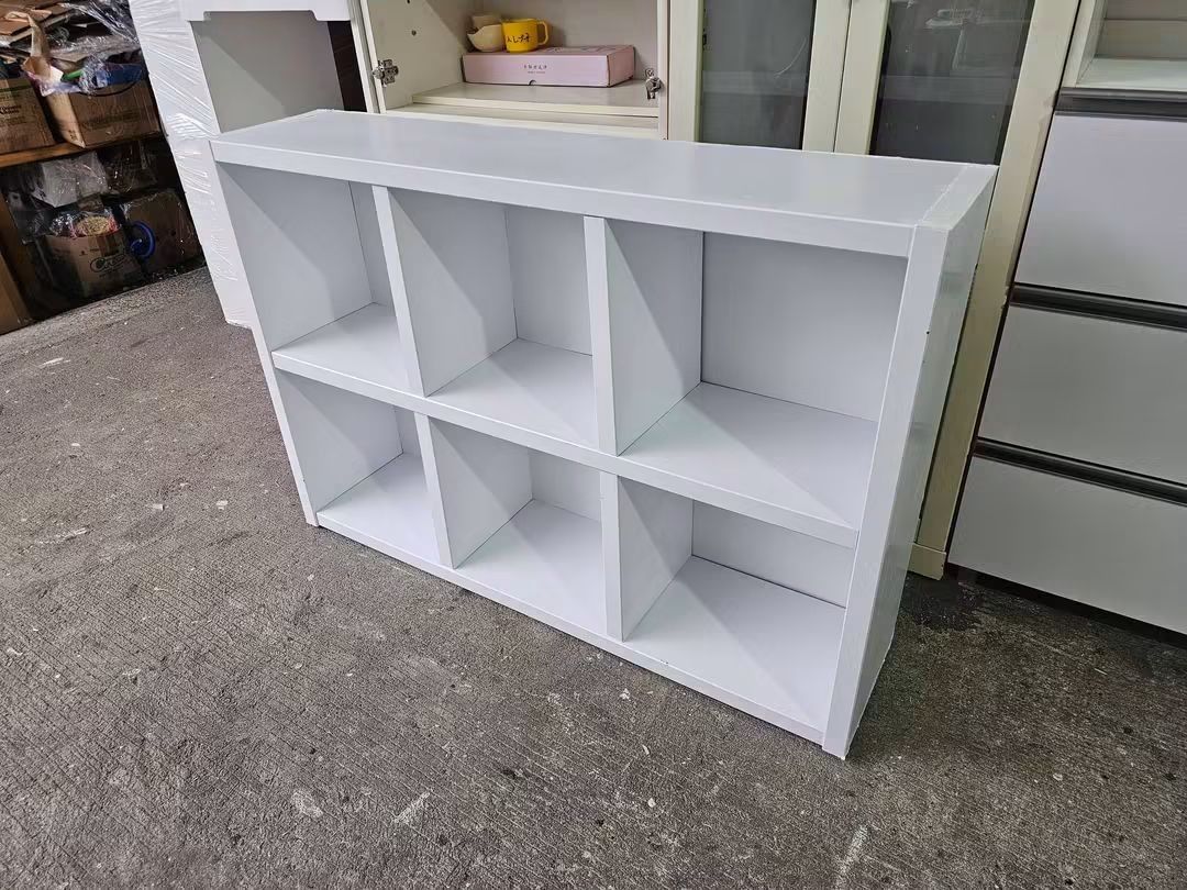 White 6-Cube Storage Shelf Organizer (Category: Shelves, Cabinets & Racks) located in Manila. Submitted by Hezcki (Listing ID 1462605156, Image 2). Description: - White storage shelf with 6 cubes - Ideal for organizing books, toys, or display items - Versatile for any room - Dimensions: Approx. 24"H x 30"W x 12"D - Easy to clean surface - Fits most standard items.