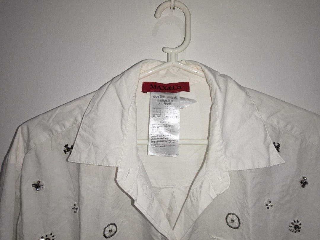 white cotton button-down shirt embellishments (Category: Longsleeves) located in Makati City. Submitted by dunseen (Listing ID 1462608550, Image 2). Description: size: Small to Med.