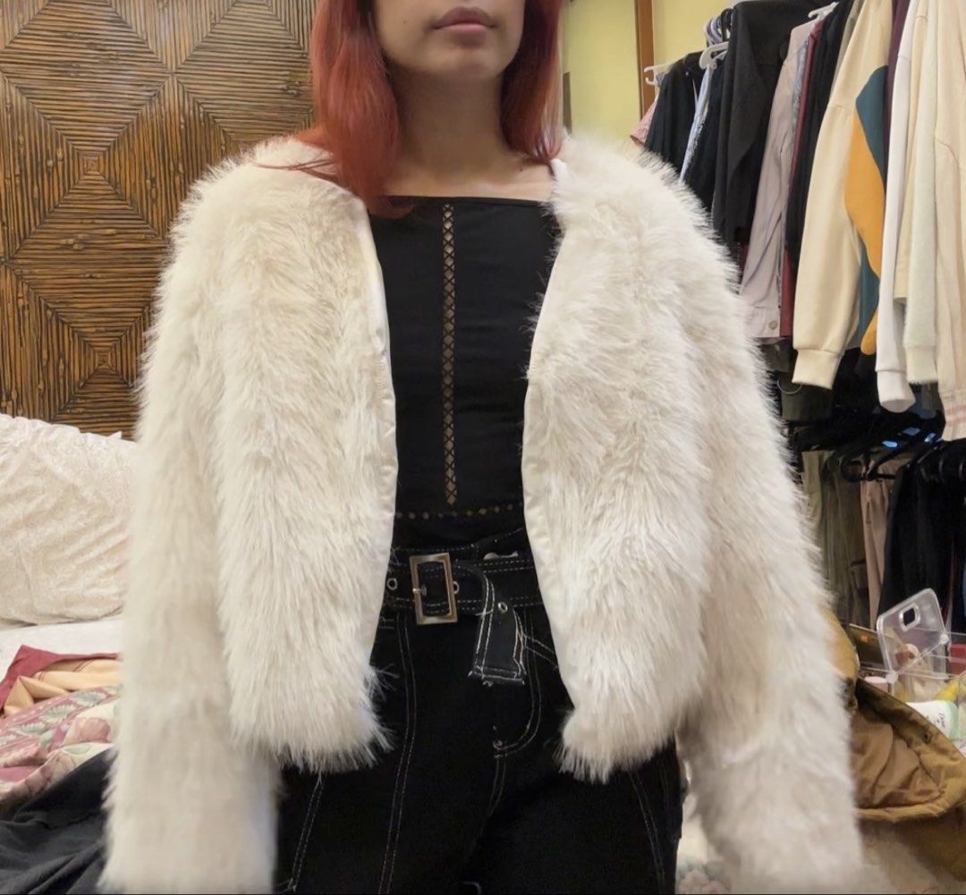 White Faux Fur Jacket - Cozy & Chic Outerwear (Category: Coats, Jackets and Outerwear) located in Manila. Submitted by allthatjazz.ph (Listing ID 1456751956, Image 3). Description: - Super soft and fluffy white faux fur - Cropped style, ideal for layering - Adds glamour and elevates any outfit - Perfect for parties or a night out - Cozy and comfortable to wear Not worn. Nadoble ung checkout kaya need to sell the other one.