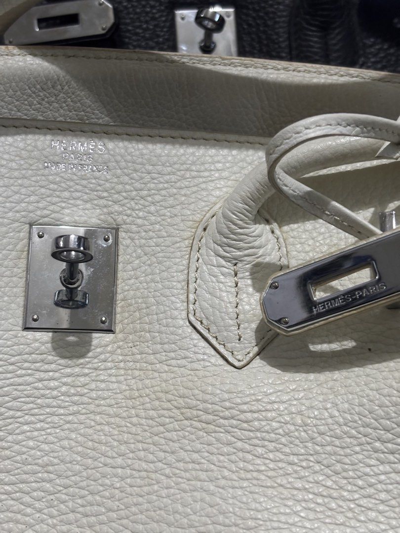 White Hermes birkin bag (Category: Luxury Bags & Wallets) located in Manila. Submitted by kingblaize (Listing ID 1462639267, Image 3). Description: It features the signature Birkin silhouette with a foldover flap, dual rolled top leather handles, and a horizontal leather belt strap.