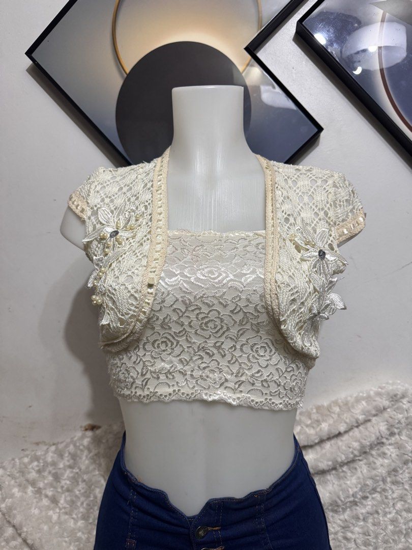 White Lace Bolero Jacket (Category: Others Tops) located in Marikina City. Submitted by lorradel (Listing ID 1462452004, Image 1). Description: - fits xs- s - Creamy white lace set - inner not included - Cropped bolero jacket with short sleeves - Features floral appliques and pearl details on the jacket - Matching inner crop top with floral lace pattern - Perfect for special occasions - Great for stylish layering with jeans or skirts - MAY HAVE s