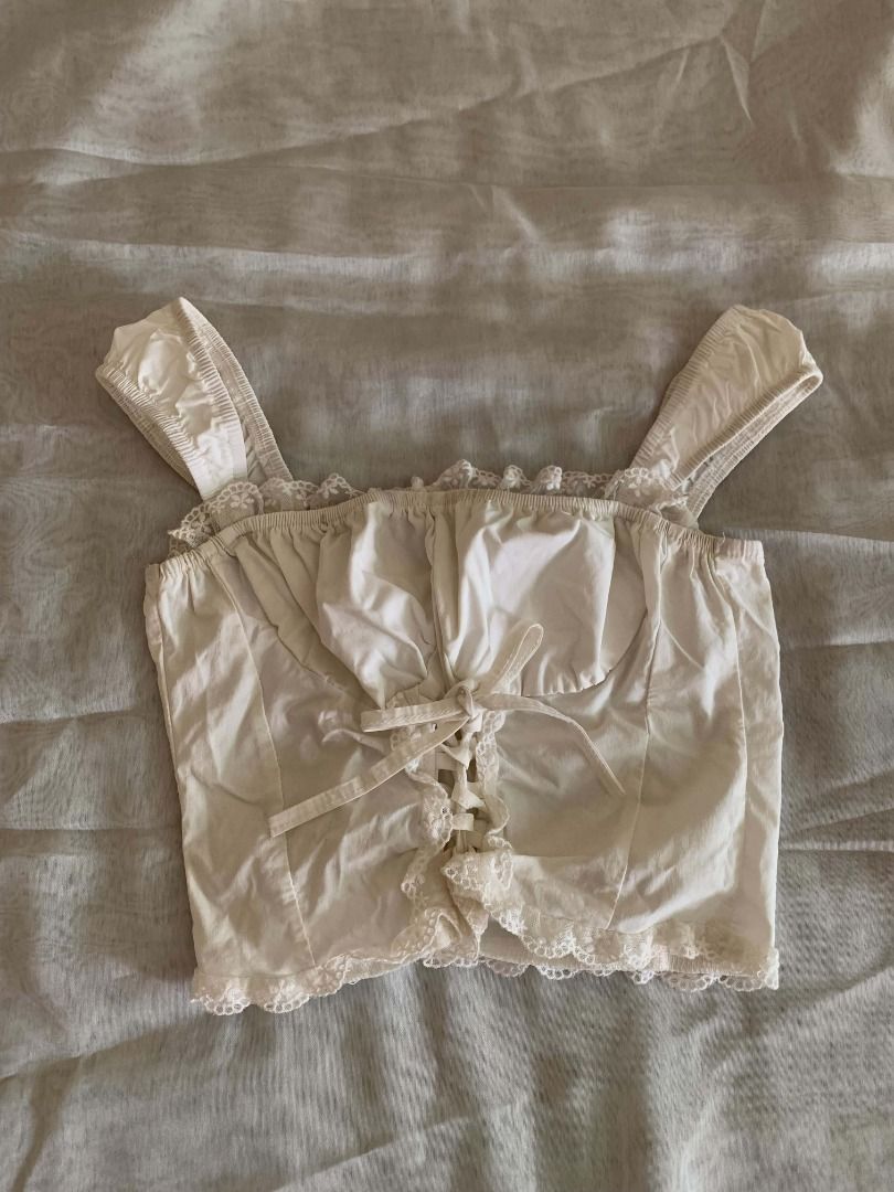 White Lace Trim Corset Crop Top (Category: Others Tops) located in Paranaque City. Submitted by juliaaafona (Listing ID 1462510247, Image 1). Description: - Cute white corset-style crop top .