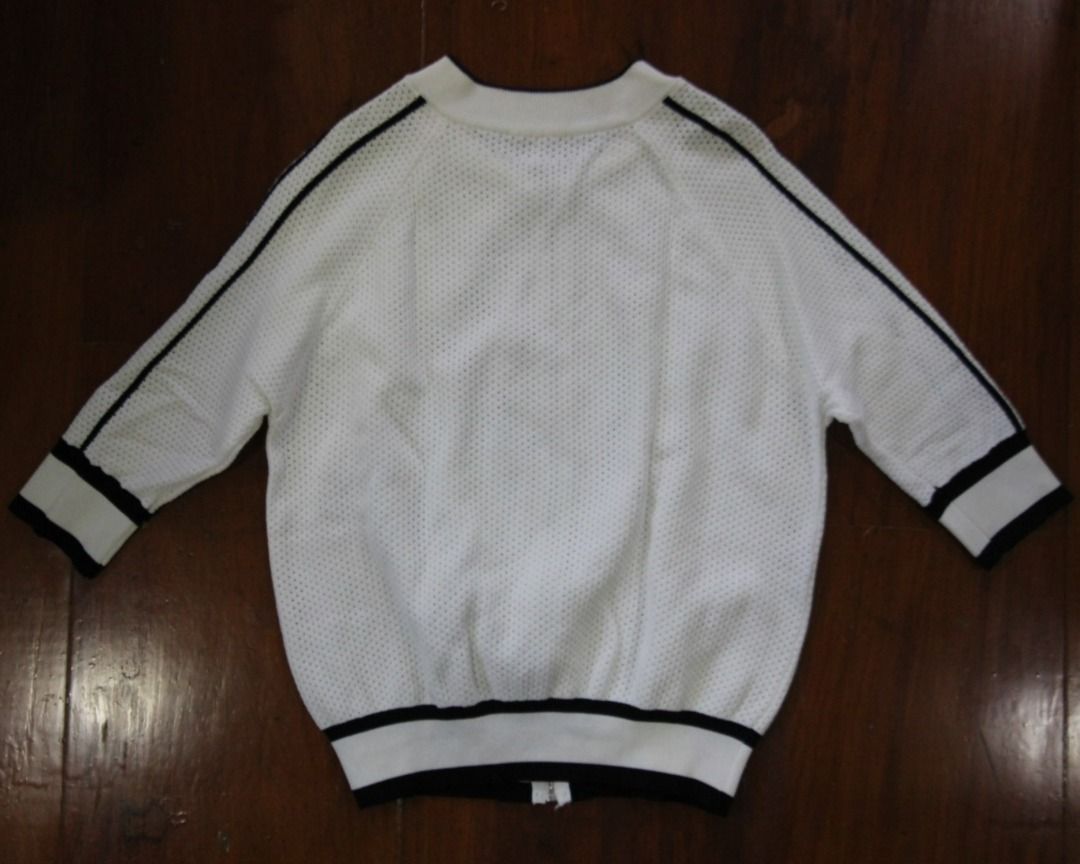 White Mesh Outer Top (Category: Others Tops) located in Manila. Submitted by chaoticgacha (Listing ID 1462509359, Image 2). Description: [NEGOTIABLE] [READ DESCRIPTION FIRST BEFORE REQUESTING] - MOD: Grab or J&T (may change depending on location) - MOP: bank transfer - no return, no refund policy Measurements when laid flat: - Chest: 46cm - Length: 56cm.