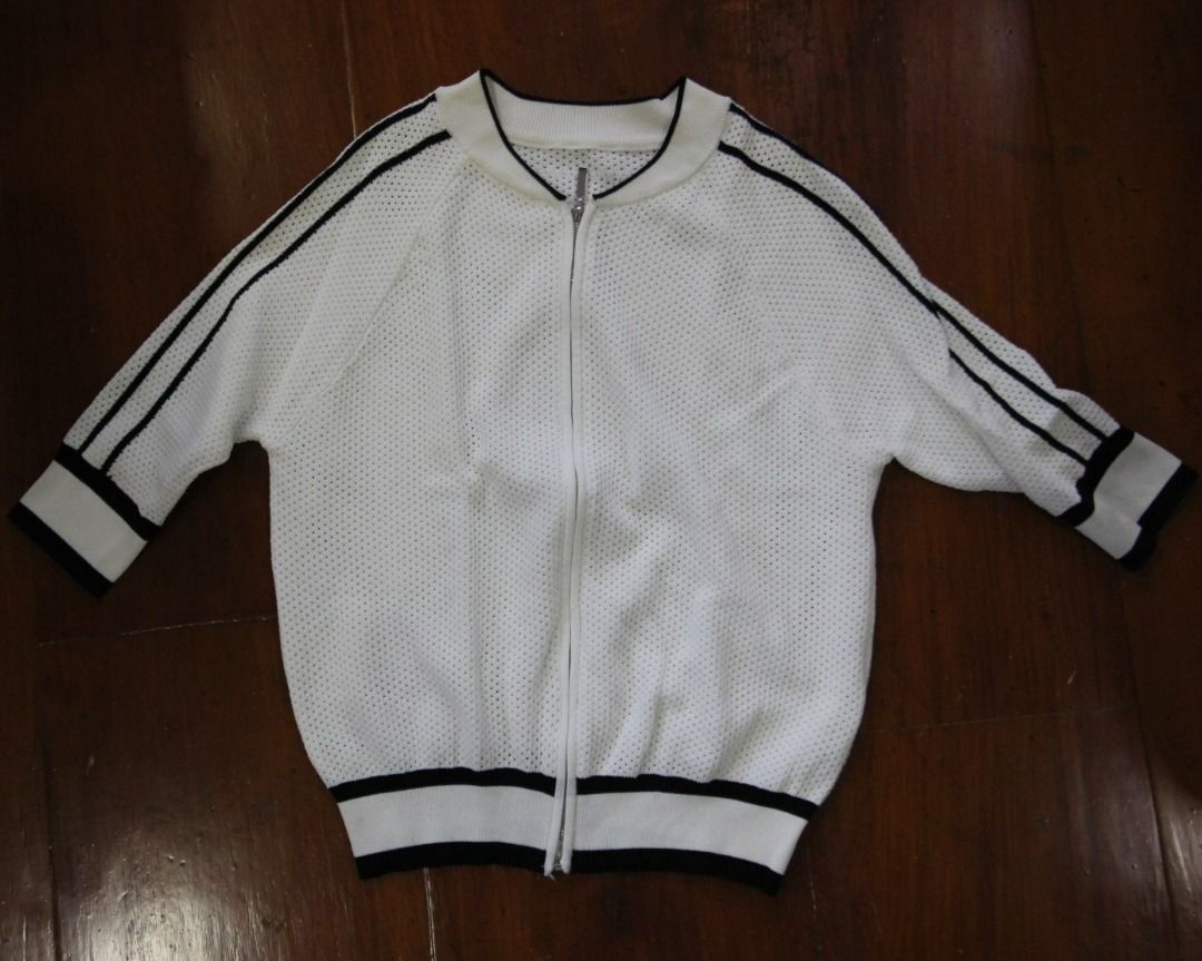 White Mesh Outer Top (Category: Others Tops) located in Manila. Submitted by chaoticgacha (Listing ID 1462509359, Image 1). Description: [NEGOTIABLE] [READ DESCRIPTION FIRST BEFORE REQUESTING] - MOD: Grab or J&T (may change depending on location) - MOP: bank transfer - no return, no refund policy Measurements when laid flat: - Chest: 46cm - Length: 56cm.