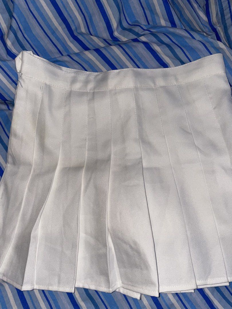 White Pleated Tennis Skirt (Category: Skirts) located in Makati City. Submitted by fashionangel.222 (Listing ID 1462638207, Image 1). Description: - White tennis skirt - Convenient side zipper closure - Has shorts inside.