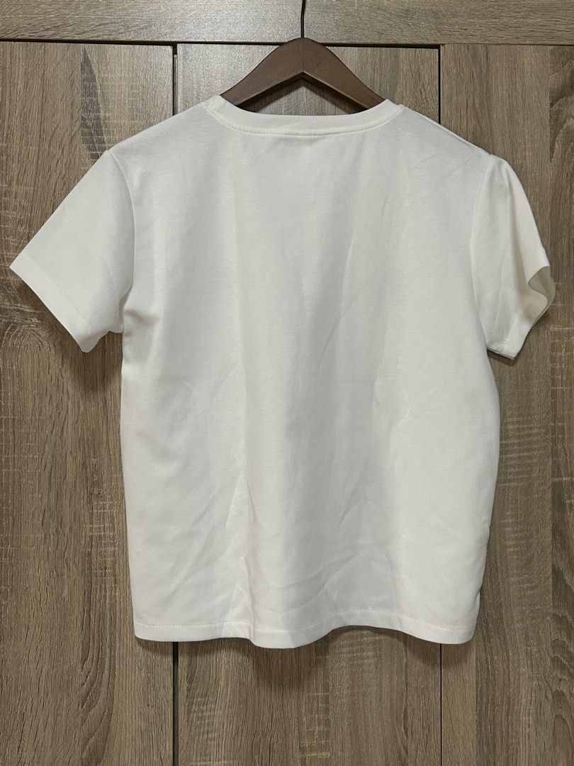 White shirt (Category: Shirts) located in Bulacan. Submitted by relove.re (Listing ID 1462583173, Image 2). Description: - white top and shirt - with printed cherry graphic art - soft fabric - good for out and about .