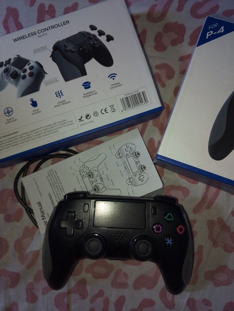 Wireless Controller for P-4 (Category: Controllers) located in Manila. Submitted by thedecluttersss (Listing ID 1462594828, Image 1). Description: 🚩STRICTLY NO COD🚩 - Wireless controller for P-4 console - Features touch function, double motor vibration, and 6-axis gyro - Connects wirelessly - Includes user manual and charging cable - Available in multiple sizes - Supports all P-4 console versions.