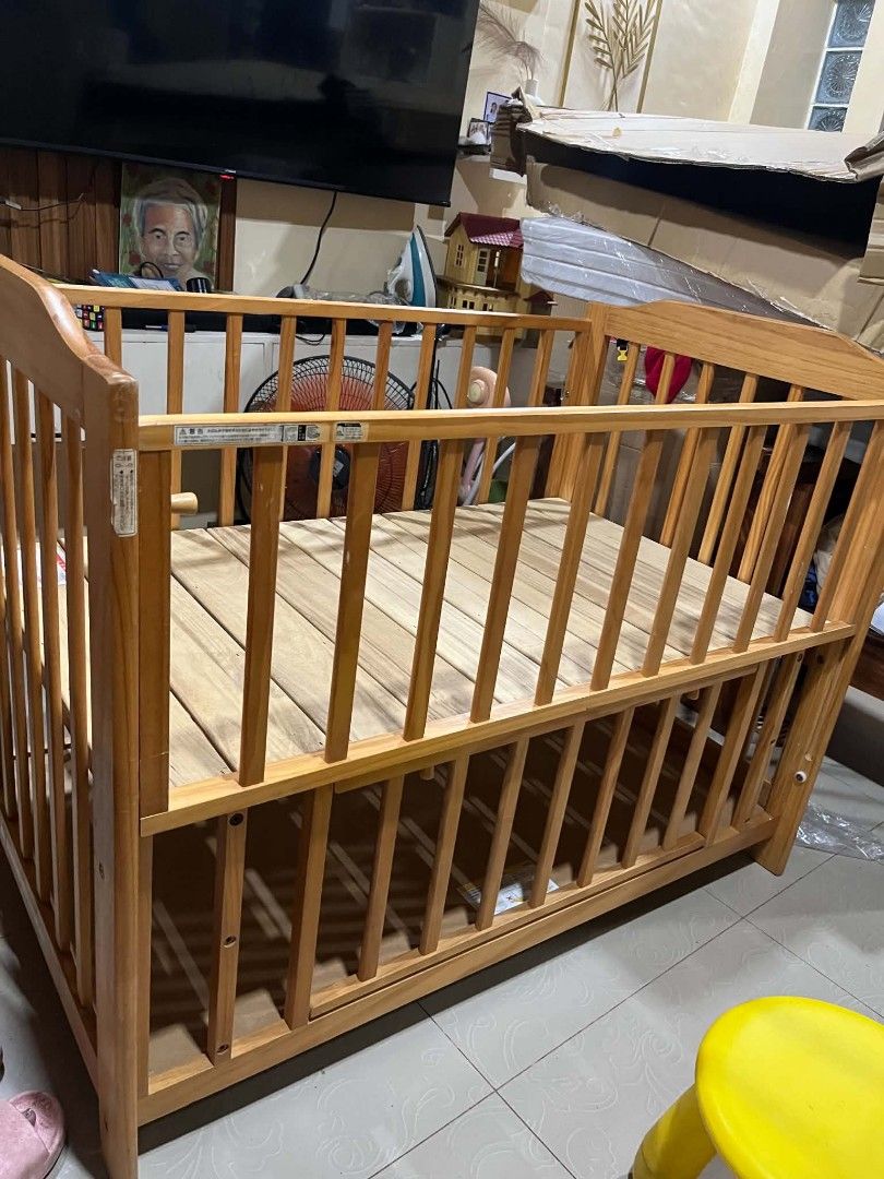 Wooden Baby Crib with Adjustable Side (Category: Cots & Cribs) located in Cavite. Submitted by dimple082 (Listing ID 1462601833, Image 1). Description: - Solid wood construction for durability - Natural wood finish complements any nursery - Lowering side panel for easy access to your baby - Two adjustable mattress levels to grow with your child - Sturdy and safe, ready for a new home.