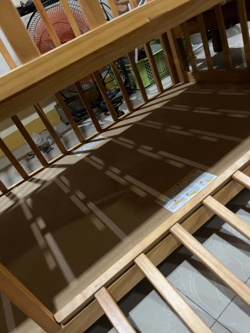Wooden Baby Crib with Adjustable Side (Category: Cots & Cribs) located in Cavite. Submitted by dimple082 (Listing ID 1462601833, Image 3). Description: - Solid wood construction for durability - Natural wood finish complements any nursery - Lowering side panel for easy access to your baby - Two adjustable mattress levels to grow with your child - Sturdy and safe, ready for a new home.