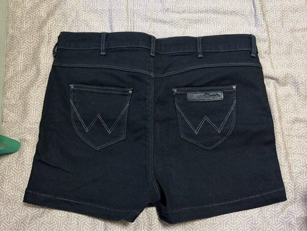 Wrangler Black Denim Shorts (Category: Shorts) located in Manila. Submitted by shopmeph (Listing ID 1462651651, Image 2). Description: - Classic black denim shorts from Wrangler - Mid-rise fit for a comfortable feel - Iconic Wrangler 'W' stitching on back pockets - Versatile for casual wear and easy to style.