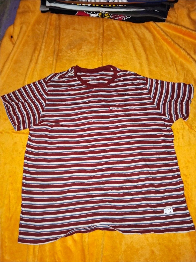 XXL Authentic Levi's stripe tee (Category: Tshirts & Polo Shirts ) located in Mabalacat. Submitted by al_amin_thrift (Listing ID 1462560339, Image 1). Description: Levi’s Retro Stripe Pocket Tee — Size XXL ​ - ✅ Authentic Levi’s — iconic heritage brand ​ - Timeless retro stripe: burgundy / white / blue ​ - Signature red Levi’s tab on chest pocket ​ - Soft lightweight cotton — all‑day comfort ​ - Size: XXL — measurements L29" × W27" ​ - Pre‑owned: