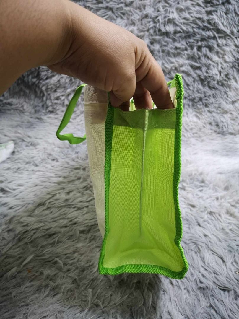 Yellow Green & White Shopper Bag (Category: Tote Bags) located in Santa Cruz. Submitted by jmy_surplus.2 (Listing ID 1462670088, Image 3). Description: Size ; L - 10 W - 14 Color ; Yellow Green , White Type ; Tote bag Brand ; No brand Material ; Nylon Style ; Zipper Closure Tote bag LR 129 JMY 1 Batch #221.