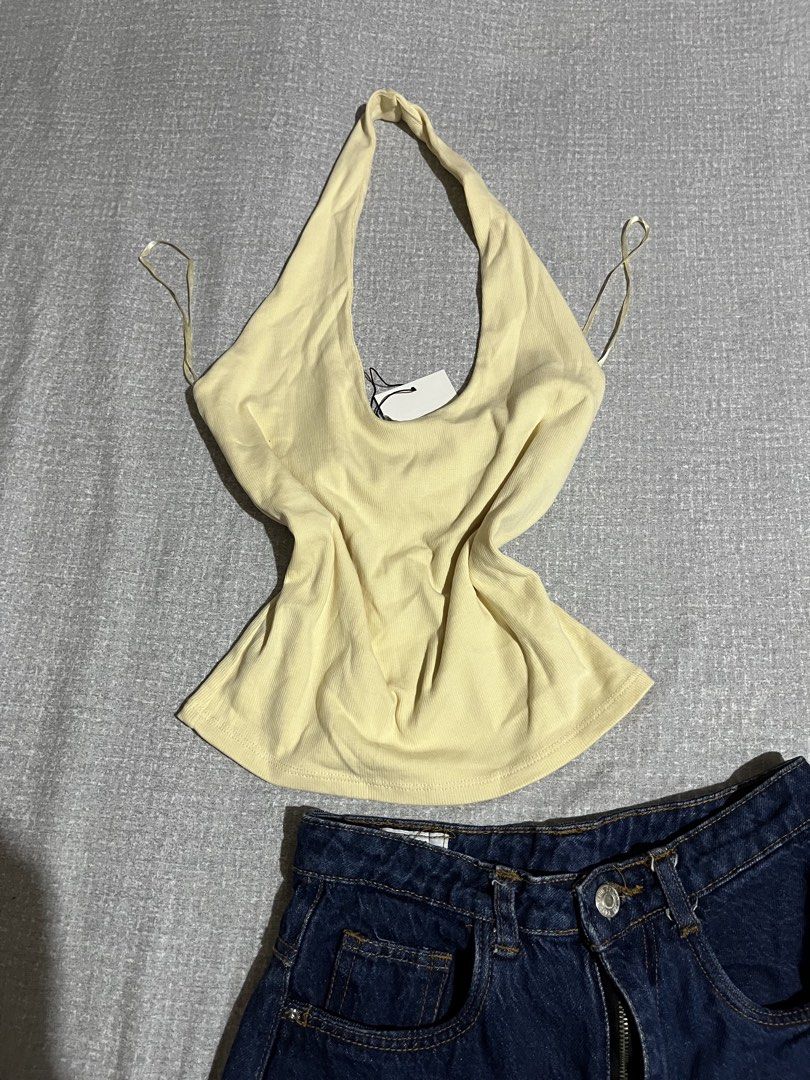 Yellow Halter Top (Category: Sets or Coordinates) located in Manila. Submitted by az0r_ (Listing ID 1462502796, Image 3). Description: - Cute yellow ribbed halter top - Ties at the back.