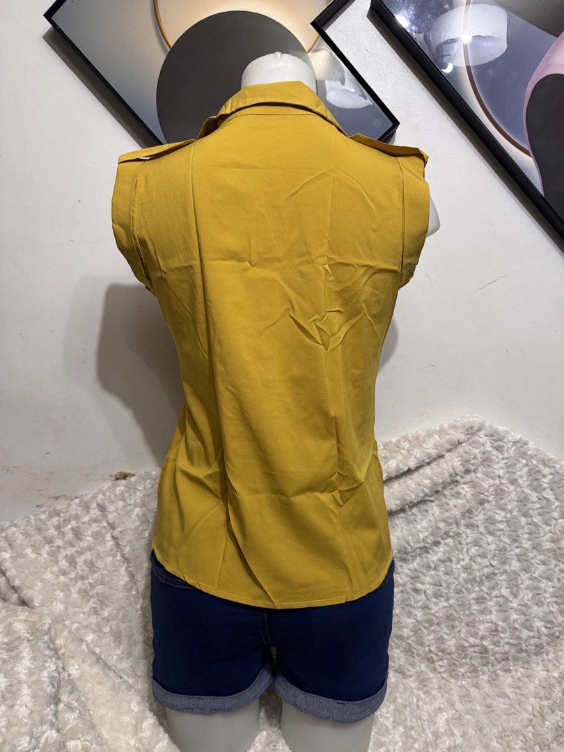 Yellow Owl Print Sleeveless Collared Blouse (Category: Blouses) located in Marikina City. Submitted by lorradel (Listing ID 1462456422, Image 3). Description: - just buy 1 item - Cute yellow sleeveless blouse - Collared neckline - Button-up front - Fun owl graphic (green, orange, black) - Ideal for casual outings - Pairs well with jeans or shorts ****091326 cocopandansack together with 091326 1-10plastic.