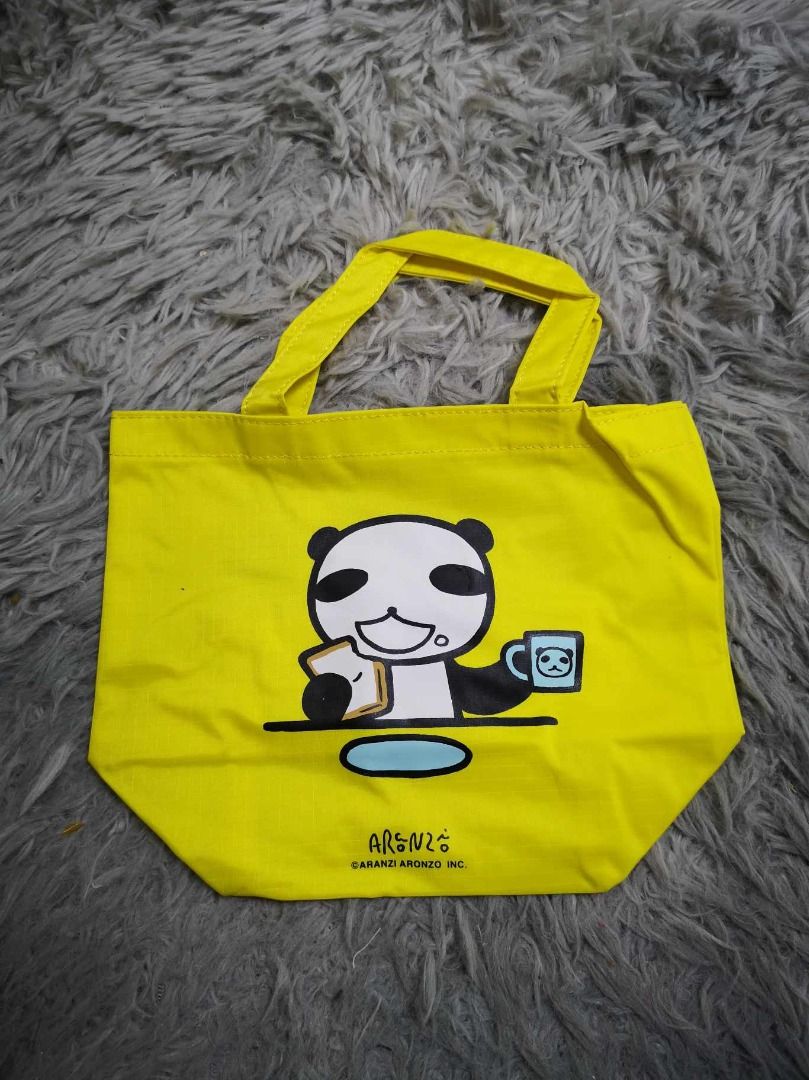 Yellow Panda Mini Tote Bag (Category: Tote Bags) located in Santa Cruz. Submitted by jmy_surplus.2 (Listing ID 1462670472, Image 1). Description: Size ; L- 7.4 W - 9.5 Color ; Yellow Type ; Tote Bag Brand ; No brand Material ; Canvas Style ; Yellow Canvas Mini Tote Bag LR 129 JMY 1 Batch #221.