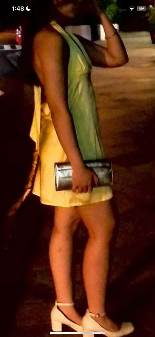 Yellow Silk Halter Dress (Category: Dresses) located in Paranaque City. Submitted by juliaaafona (Listing ID 1462508792, Image 2). Description: - Yellow halter neck dress - Flattering V-neckline - Fabric with a slight sheen - Midi length - Has a small stain .