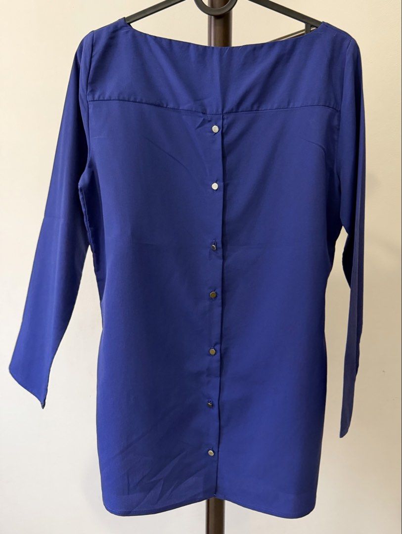 Zara Basic Blouse (Category: Longsleeves) located in Kuala Lumpur. Submitted by clothes.clothes_clothes (Listing ID 1462514827, Image 3). Description: Zara Basic Colour : Blue Neckline: Boat neck Design: Button down back Material : Georgette .