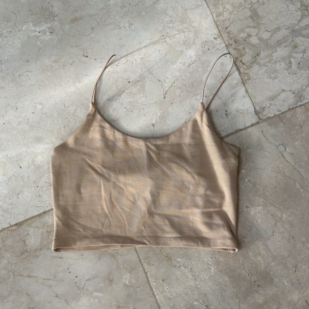 ZARA Beige Crop Top (Category: Sleeveless) located in Lapu Lapu. Submitted by pangayamph (Listing ID 1462670717, Image 1). Description: - Zara Beige Crop Top - Spaghetti Straps - Size: L - Material: 95% Cotton, 5% Elastane - Made in Bangladesh - Perfect basic piece, easy to style with anything!.