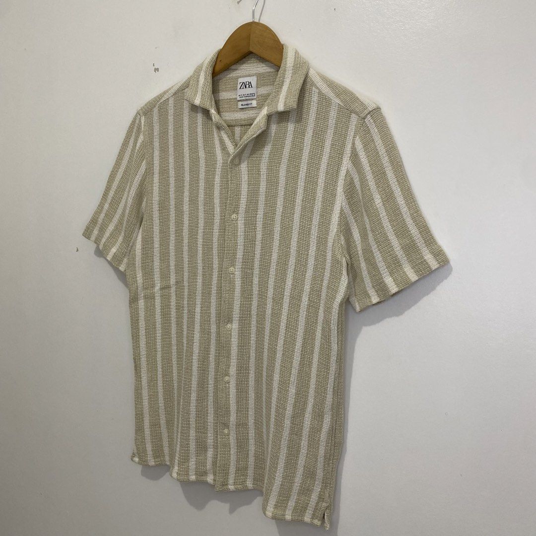 Zara Knitted Polo (Category: Tshirts & Polo Shirts ) located in Tanauan. Submitted by flexingthriftsph (Listing ID 1462616891, Image 2). Description: Zara Knitted Polo Small on tag 18 inches - chest 27 inches - length Excellent condition -800.00.