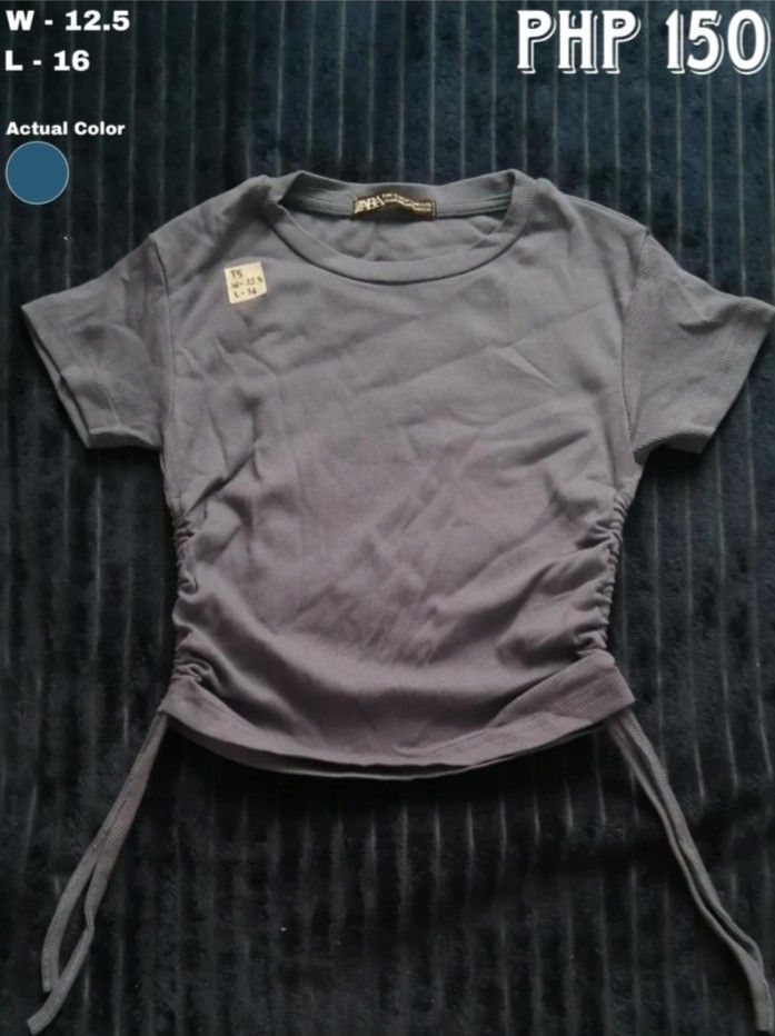 Zara Ruched Drawstring Top (Category: Blouses) located in Batangas. Submitted by zenshark-e5f6 (Listing ID 1462445524, Image 1). Description: - Grey Zara Top - Size: L-16 - Features: Ruched sides, adjustable drawstring - Neckline: Round - Sleeves: Short - Style: Casual wear.