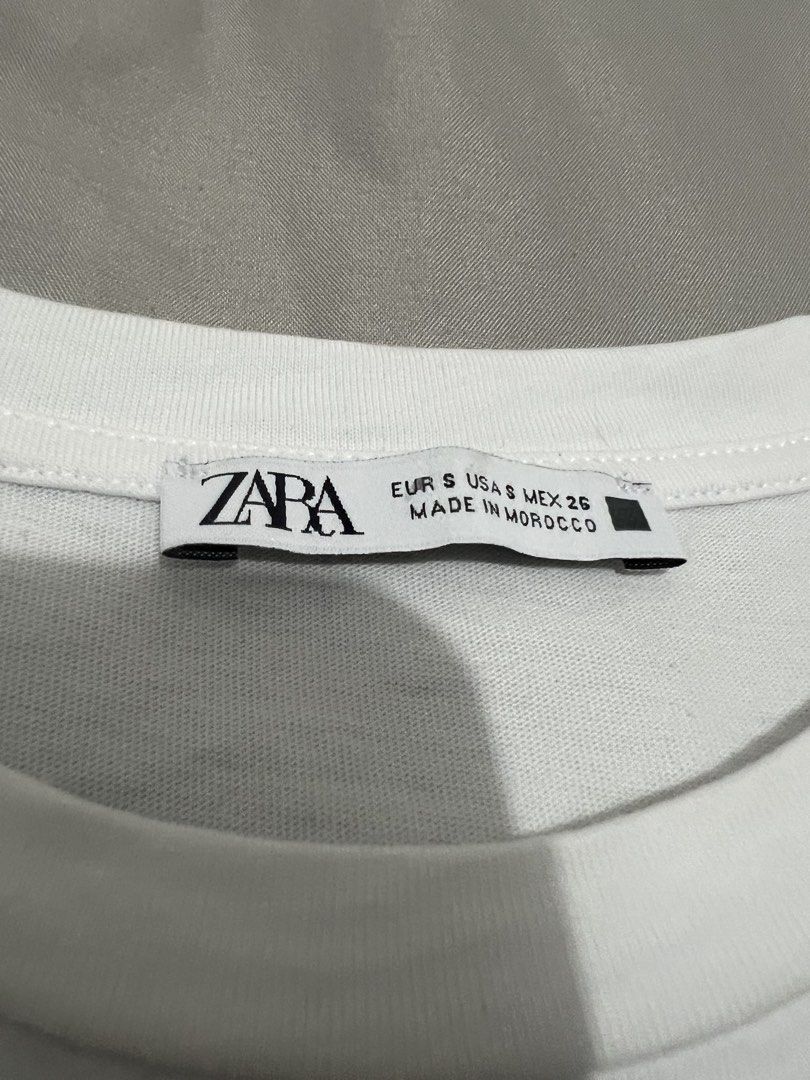 Zara White Ruffle Sleeve T-shirt (Category: Shirts) located in Carmona. Submitted by mystyleph (Listing ID 1462563136, Image 3). Description: - Brand: Zara - Color: White - Size: S - Features: Cute ruffle sleeves - Style: Simple and versatile - Occasion: Casual wear.