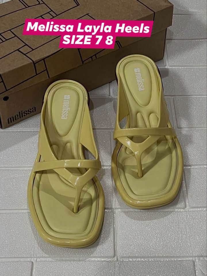 100%ORIGINAL MELISSA (Category: Heels) located in Manila. Submitted by mydytrends (Listing ID 1462855852, Image 1). Description: - 100% Original Melissa Layla Heels - Size: 7-8 - Color: Light Yellow - Material: Melissa's signature PVC - Style: Chic thong heels - Condition: Excellent, pre-loved.