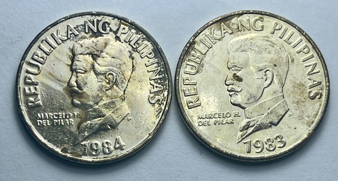 1984, 1983 Fifty Cents error coins (Category: Currency) located in Mandaluyong City. Submitted by brightbear_6d8f63 (Listing ID 1462782725, Image 1). Description: Wrong spelling scientific name at rev of the 1983 coin.