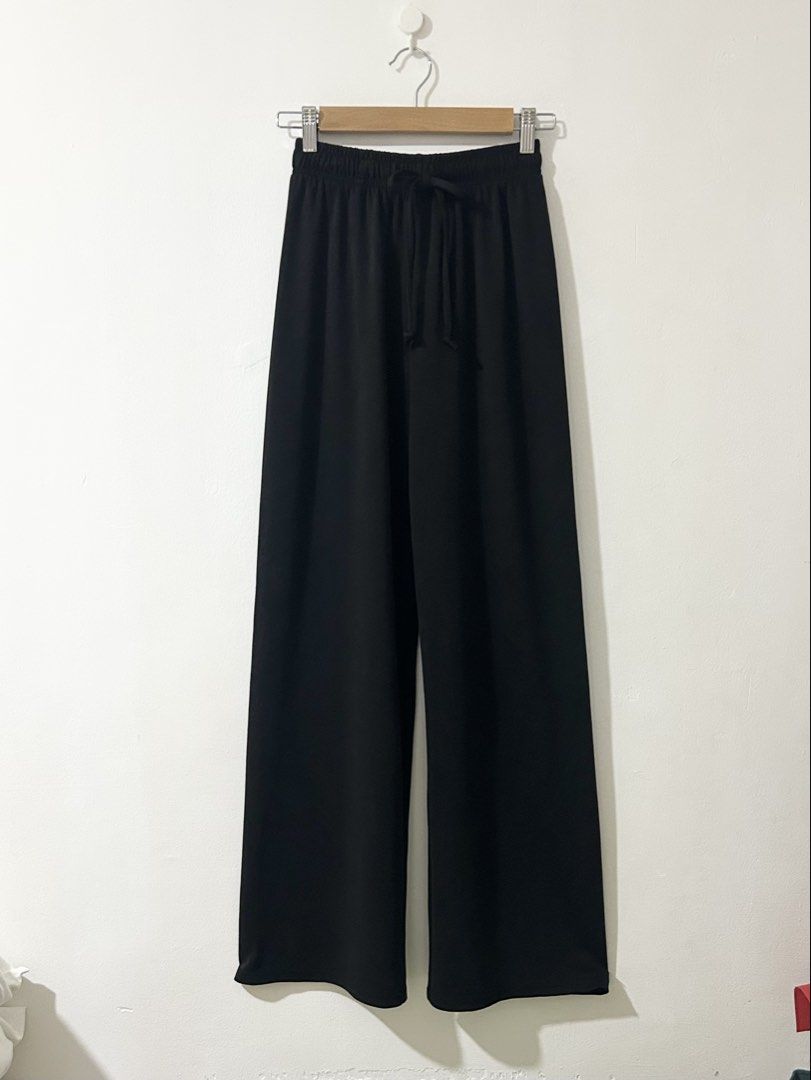 [23-26”] Black High Rise Wide Leg Pull On Drawstring Pants (Category: Other Bottoms) located in Tanza. Submitted by shop_qrated (Listing ID 1462883333, Image 2). Description: Black High Rise Wide Leg Pull On Drawstring Pants. Fits 23-26” waistline. Best for tall frames..