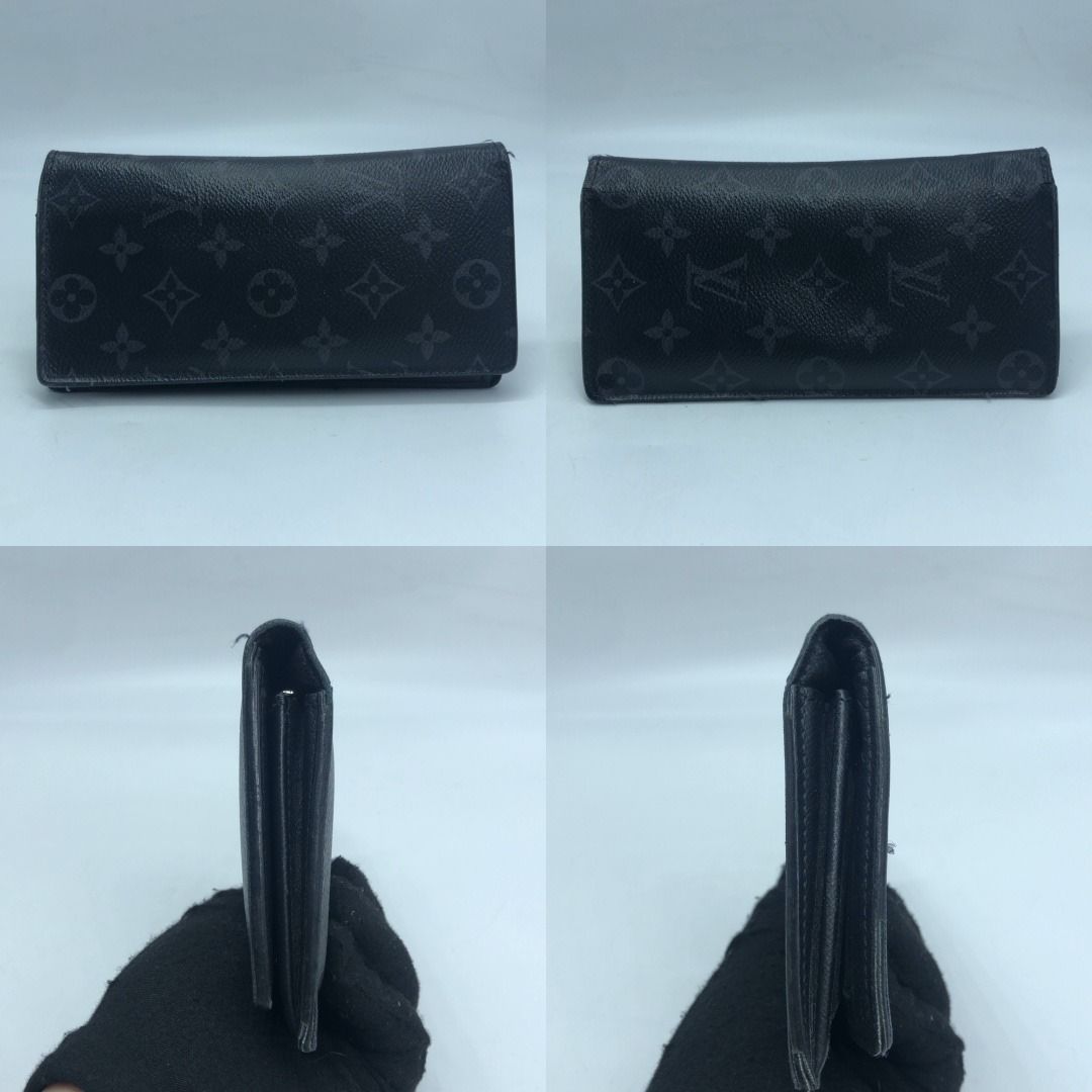 267009170 LOUIS VUITTON SLG ECLIPSE BRAZZA LONG WALLET RFID MB0414B (Category: Luxury Bags & Wallets) located in Taguig. Submitted by ecoring.ph (Listing ID 1462800586, Image 2). Description: ◆CONDITION: B- ◆DESCRIPTIONS: (Other defects/info:) OUTER The body of the wallet has scratches, scuffs, stains, dirt, press marks, deformed, wrinkled, and shows sign of heavy use. The rubber lining and edges have scratches, scuffs, cracks, chips, fraying, pr