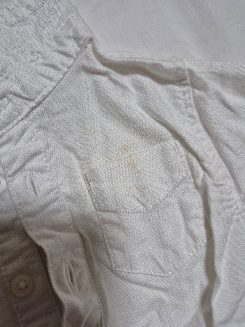 2x Baby Boy Bodysuits - White & Blue (Category: Babies & Kids Fashion) located in Santo Tomas. Submitted by bellaswann18 (Listing ID 1462785468, Image 3). Description: white is longsleeve 0-3 mos, pwede sa photoshoot, with some stain due to storage pero mawawala if wash brand is baby Junior (a UAE brand) blue is 6 mos and up, OShkosh.