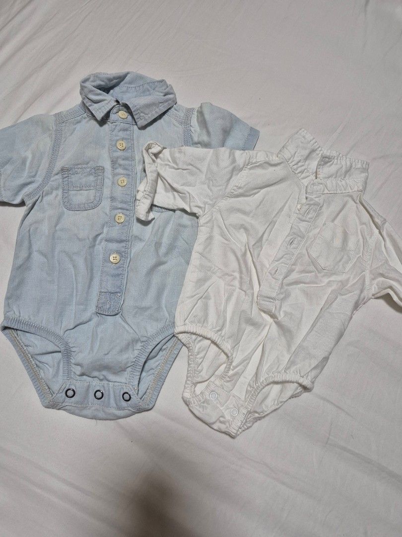 2x Baby Boy Bodysuits - White & Blue (Category: Babies & Kids Fashion) located in Santo Tomas. Submitted by bellaswann18 (Listing ID 1462785468, Image 2). Description: white is longsleeve 0-3 mos, pwede sa photoshoot, with some stain due to storage pero mawawala if wash brand is baby Junior (a UAE brand) blue is 6 mos and up, OShkosh.