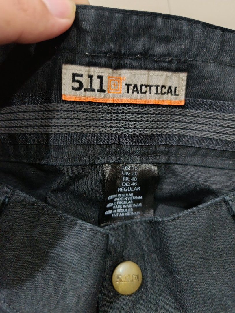 5.11 Tactical Cargo Pants Men's Size 16 Regular Black (Category: Jeans) located in Davao. Submitted by idioticthrifter (Listing ID 1462868329, Image 2). Description: - Brand: 5.11 Tactical - Type: Cargo Pants - Color: Black - 34 waist x 40 length - Origin: Made in Vietnam - Material: 65% Polyester, 35% Cotton - Features: Durable, multiple pockets - Ideal for: Work, outdoor activities.