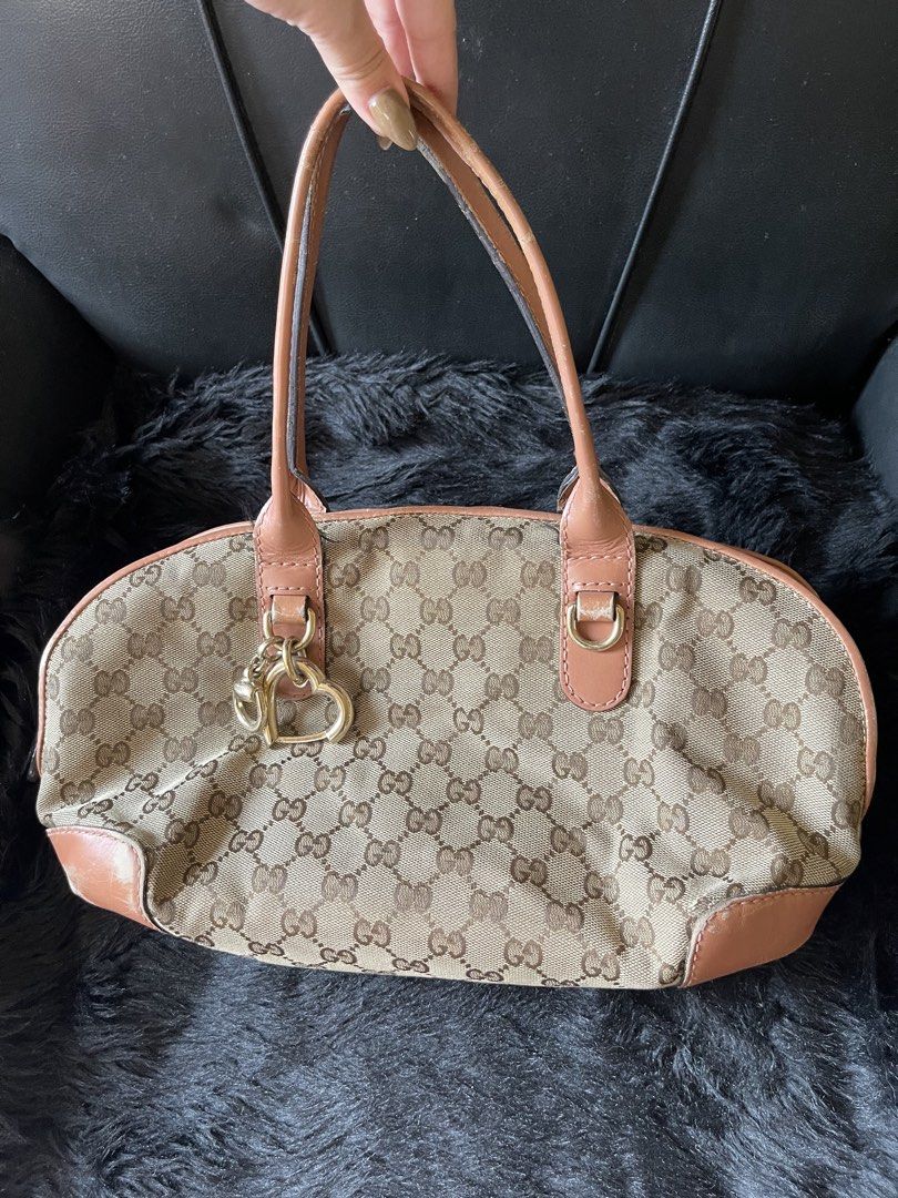 Assorted Gucci Shoulder / Baguette Bags (Category: Luxury Bags & Wallets) located in Davao. Submitted by boodle4lyf (Listing ID 1462771464, Image 2). Description: PRICE MAY VARY PER SLIDE ALL AUTHENTIC PLS ASK FOR MORE PHOTOS 2. ❌ RESERVED ₱5,500 GG BLACK SHOULDER BAG W/ MONOGRAM INTERIOR TRIM G.A. RECOLORED TO BLACK BUT NOT STICKY / MATTE ANG FEELING. 4. ❌SOLD GG MONOGRAM WITH ORANGE LEATHER TRIM G.A WITH SIGNS OF USE. FADED CORNERS, RUBS AND DI