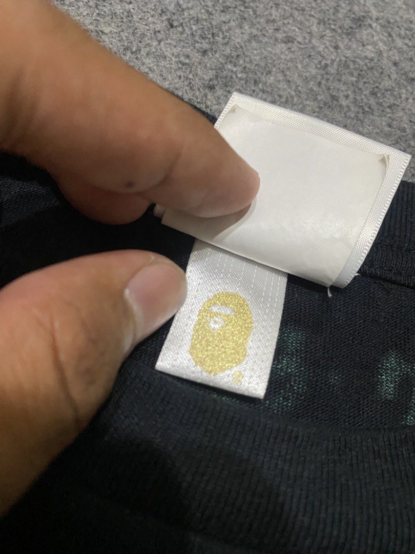 A Bathing Ape BAPE Tee Black Size S (Category: Tshirts & Polo Shirts ) located in Cebu City. Submitted by yazherizthrifting (Listing ID 1462819370, Image 3). Description: - Authentic Black BAPE T-shirt - Features classic ape graphic and BAPE logo on front - Size: S - Guaranteed authentic (check tags) - Ideal for streetwear fans.