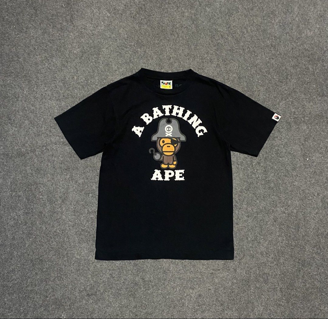 A Bathing Ape BAPE Tee Black Size S (Category: Tshirts & Polo Shirts ) located in Cebu City. Submitted by yazherizthrifting (Listing ID 1462819370, Image 1). Description: - Authentic Black BAPE T-shirt - Features classic ape graphic and BAPE logo on front - Size: S - Guaranteed authentic (check tags) - Ideal for streetwear fans.