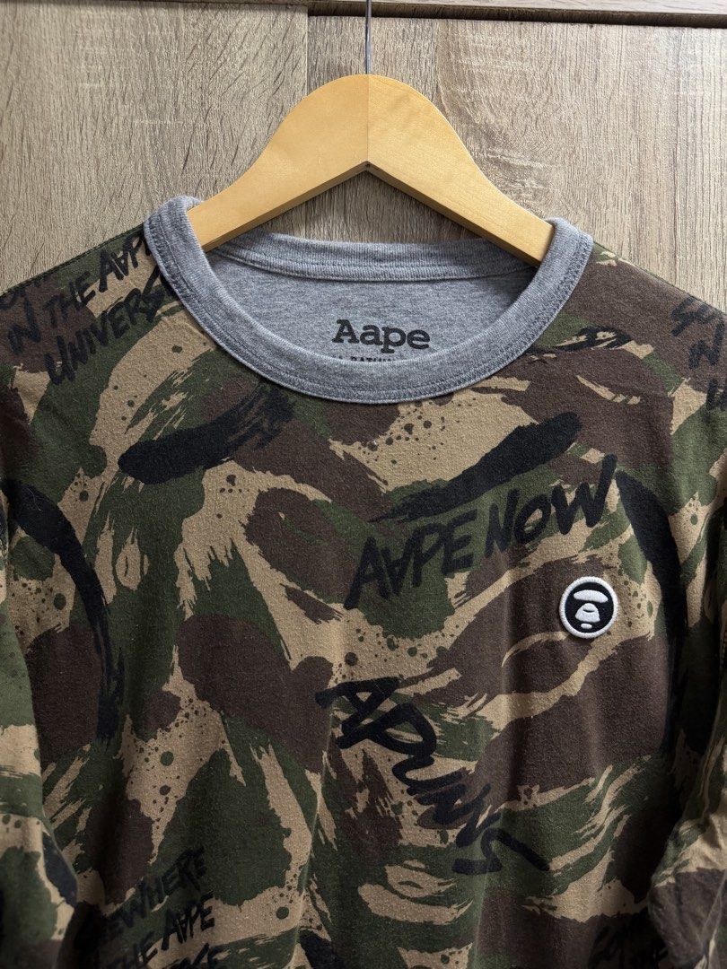 Aape Reversible Camouflage Longsleeve Shirt (Category: Coats, Jackets and Outerwear) located in Cavite. Submitted by PRIVATE.Selection (Listing ID 1462774708, Image 3). Description: Aape Reversible Camouflage Longsleeve Shirt Size S-M W 21 L 26 Excellent Condition .