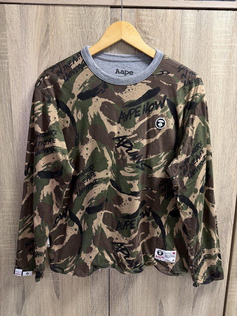 Aape Reversible Camouflage Longsleeve Shirt (Category: Coats, Jackets and Outerwear) located in Cavite. Submitted by PRIVATE.Selection (Listing ID 1462774708, Image 1). Description: Aape Reversible Camouflage Longsleeve Shirt Size S-M W 21 L 26 Excellent Condition .