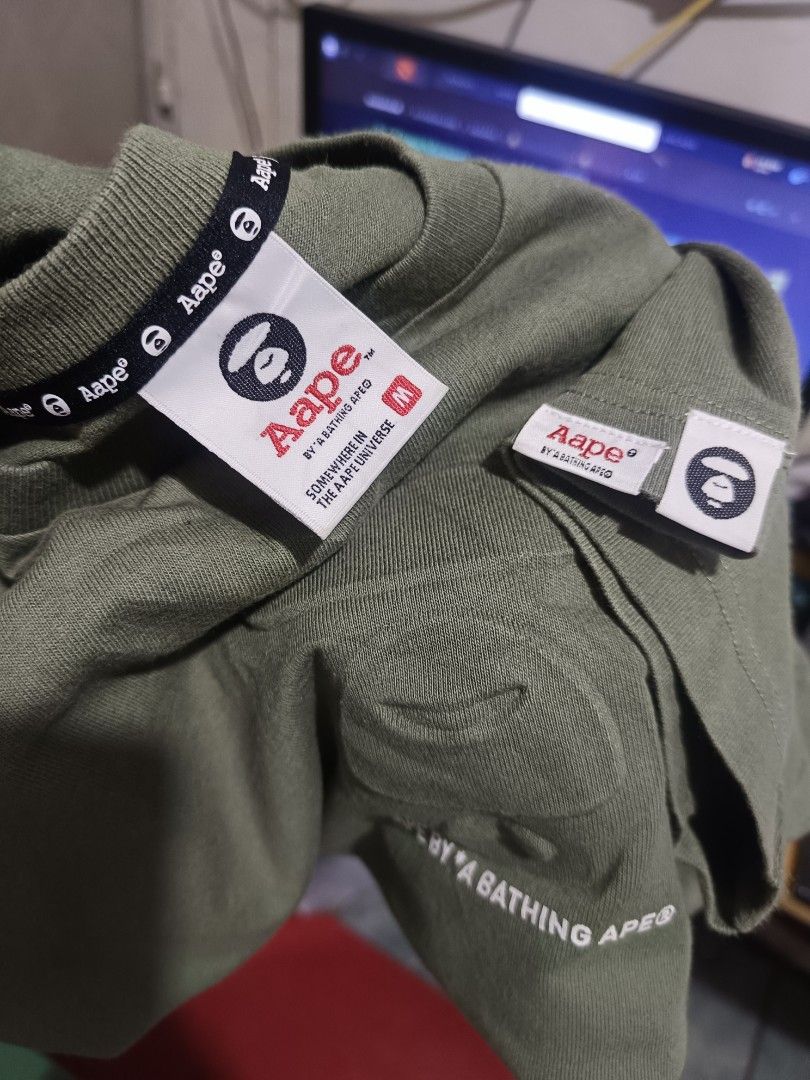 Aape shirt Army Green (Category: Tshirts & Polo Shirts ) located in Cebu City. Submitted by negotiableprice22 (Listing ID 1462882632, Image 1). Description: AAPE SHIRT AAPE BY BATHING APE ARMY GREEN SIZE M Dimes measured on flat surface WIDTH 20 inch LENGTH 27 inch available price negotiable.