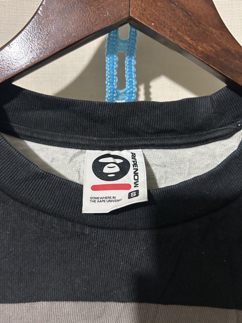AAPE stripe Tee (Category: Activewear) located in Santa Rosa. Submitted by unexpected.finds4026 (Listing ID 1462877914, Image 2). Description: Small on tag OVER SIZE 21W 26.5 L best fit to M - Semi L complete tags heavy cloth 9.5/10 color rate no flaws .