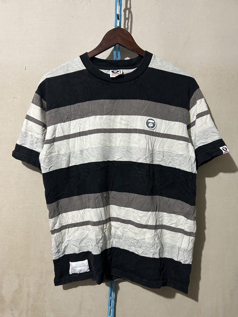 AAPE stripe Tee (Category: Activewear) located in Santa Rosa. Submitted by unexpected.finds4026 (Listing ID 1462877914, Image 1). Description: Small on tag OVER SIZE 21W 26.5 L best fit to M - Semi L complete tags heavy cloth 9.5/10 color rate no flaws .