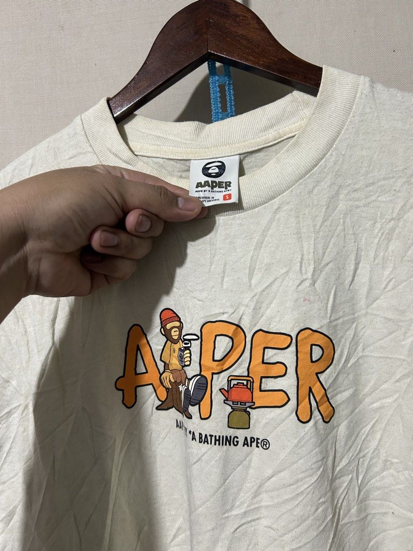 AAPE tee (Category: Activewear) located in Santa Rosa. Submitted by unexpected.finds4026 (Listing ID 1462877853, Image 3). Description: Small on tag OVER SIZE 22W 28L best fit to M - L complete tags 9.5/10 color rate issue : Lints need wash.