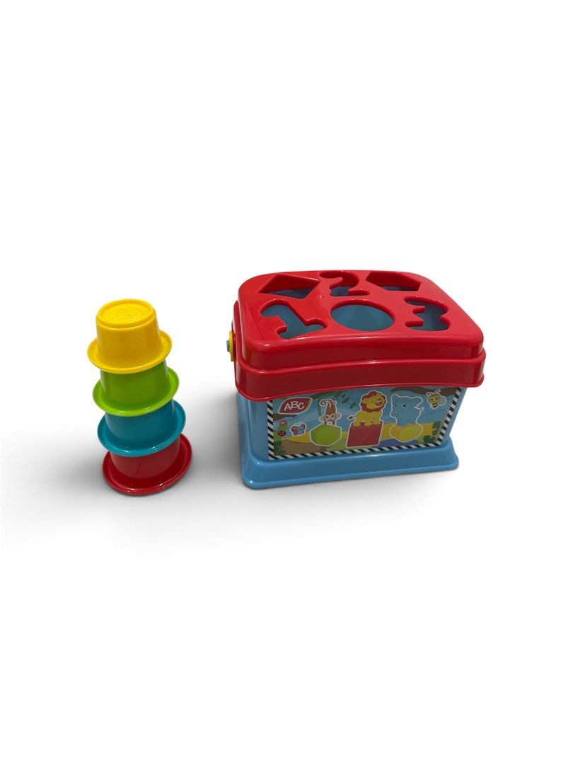ABC Laugh 'n Learn Shape Sorter Stacker Toy (Category: Educational & Learning Toys) located in Paranaque City. Submitted by mrs.myoden (Listing ID 1462818329, Image 2). Description: - Fun shape sorter and stacking toy for little ones. - Includes sorter box, lid, various shapes, and stacking tower with rings. - Bright, engaging colors. - Recommended for ages 12 months and up. - Great for developing motor skills and shape recognition. Brand New Pri