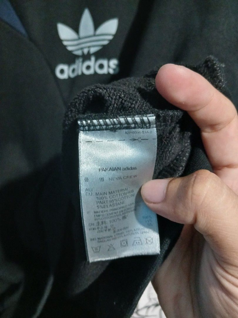 🔥Adidas🔥 (Category: Coats, Jackets and Outerwear) located in Cadiz. Submitted by jcthrifting (Listing ID 1462814648, Image 3). Description: 🔥Adidas🔥 Neva Vintage Crewneck Sweatshirt Authentic✅️ multi-colored angled panels across shoulder classic center chest Trefoil logo L on tag 21W×28L excellent no issue 📩.
