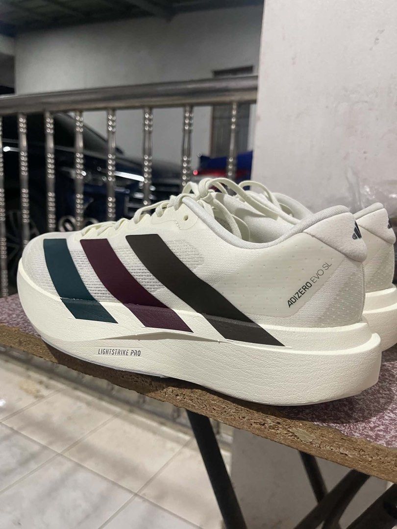 Adidas Adi Zero Evo Sl (Category: Casual Shoes) located in Cavite. Submitted by declutteringthingzz (Listing ID 1462839544, Image 1). Description: Brandnew Unique colorway With paperbag and box Bought this in commonwealth sm aura.