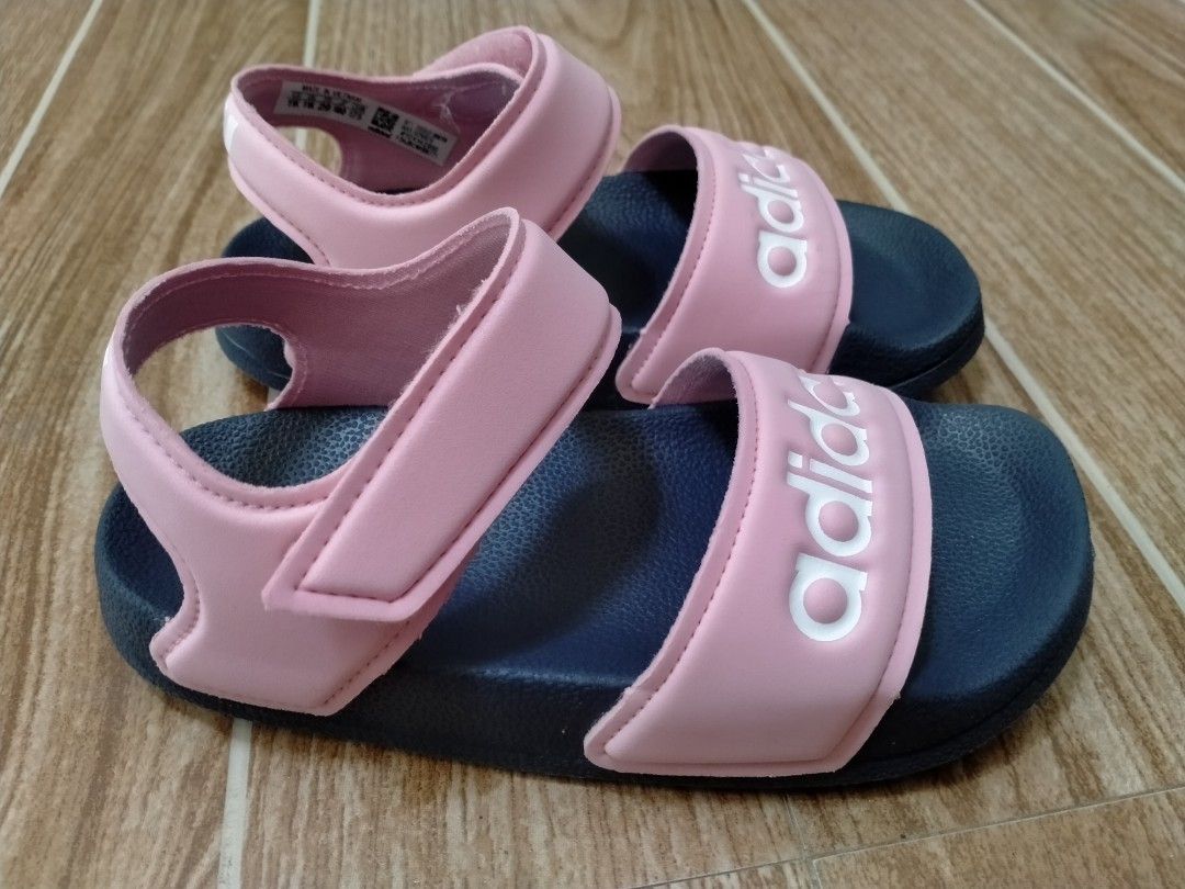 ADIDAS ADILETTE KIDS SLIDE (Category: Babies & Kids Fashion) located in Cabuyao City. Submitted by Bike_Clothing10 (Listing ID 1462687262, Image 2). Description: READ FIRST... FOR SALE: ADIDAS ADILETTE KIDS SANDALS Excellent Condition Size 11K Us | 17cm Legit NOTE: Slight Heel Drag PRICE: 650 + SF PICK UP OR SHIPPING ONLY LOCATION: Cabuyao Laguna -NO COD/COP- DM....