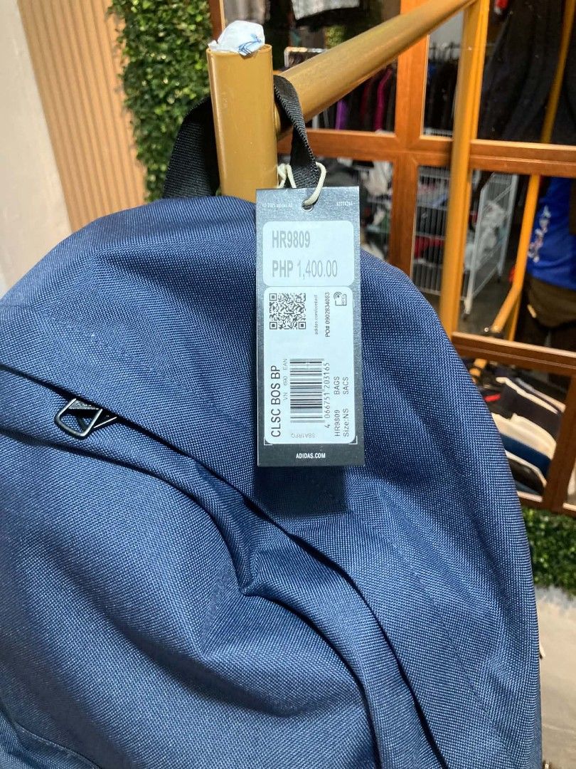 Adidas Classic Backpack Navy Blue HR9809 (Category: Backpacks) located in Trece Martires City. Submitted by djaothriftshop (Listing ID 1462781744, Image 2). Description: - Classic navy blue Adidas backpack - Features the iconic white trefoil logo on the front - Plenty of space for essentials - Ideal for school or everyday use - Original tag still attached - Original price: PHP 1,400.00.